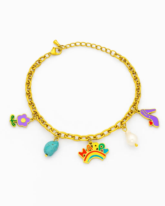 Gold bracelet with colorful charms on a white background