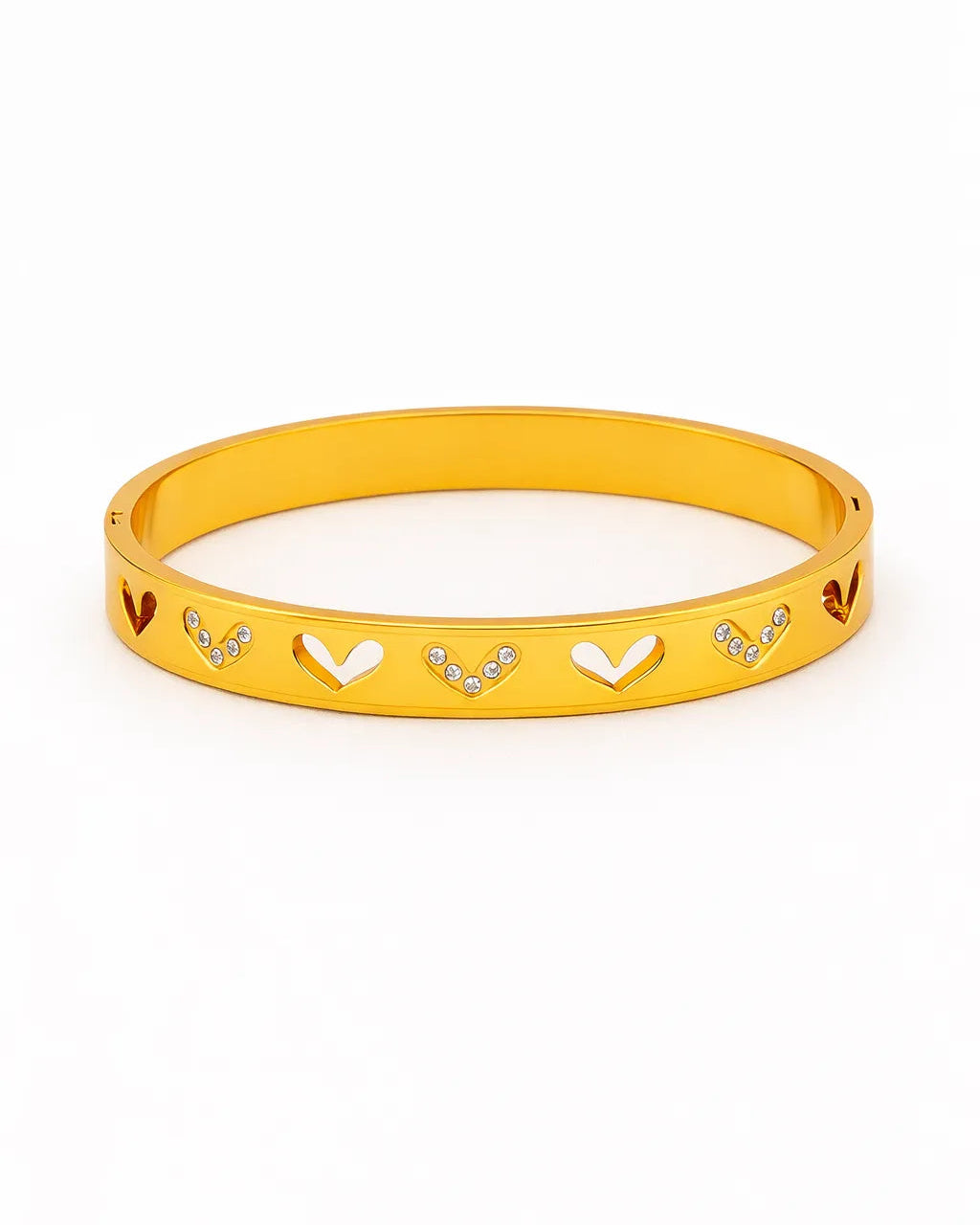 Yellow bracelet with heart and arrow designs on a white background