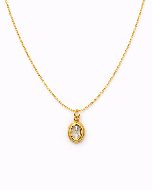 Gold necklace with a pendant on a white background