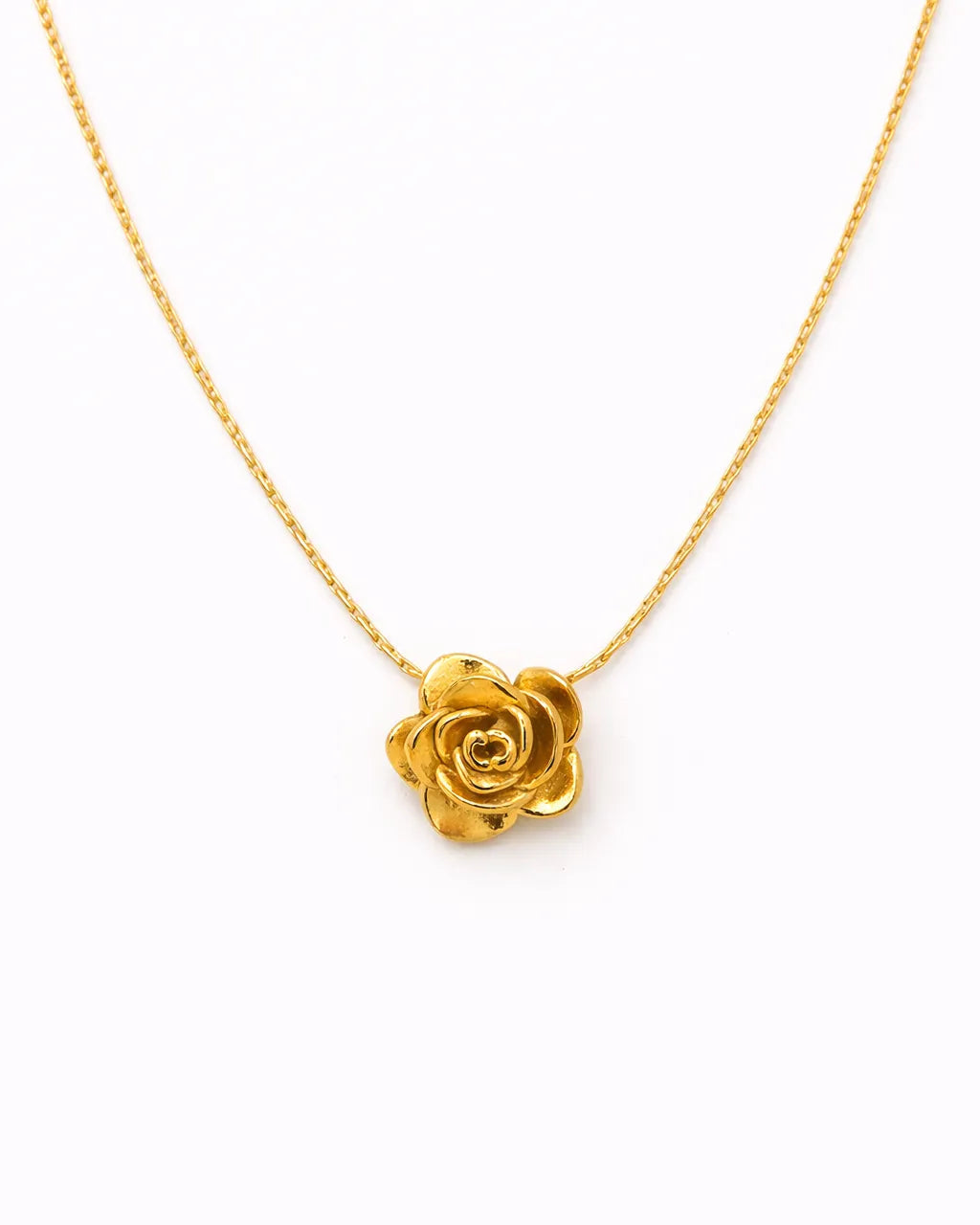Gold rose necklace on a white background