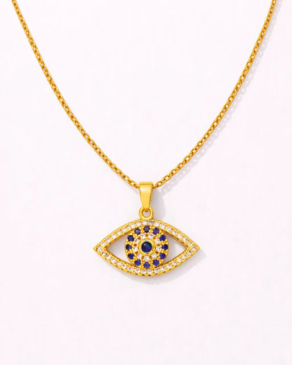 Gold necklace with an eye-shaped pendant featuring blue stones on a white background