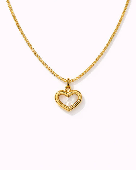 Gold heart-shaped pendant necklace on a white background