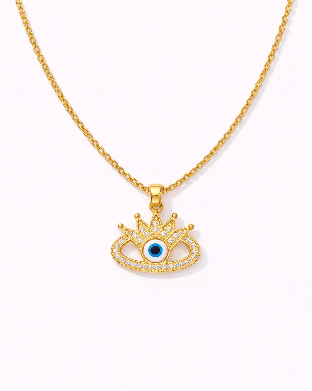 Gold necklace with an eye-shaped pendant on a white background