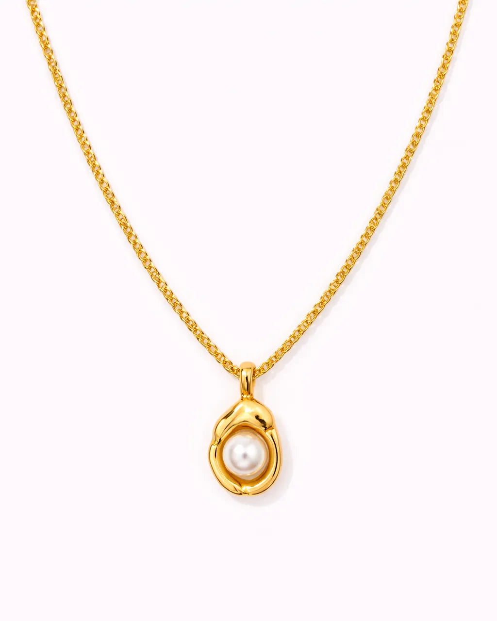 Gold necklace with a pearl pendant on a white background