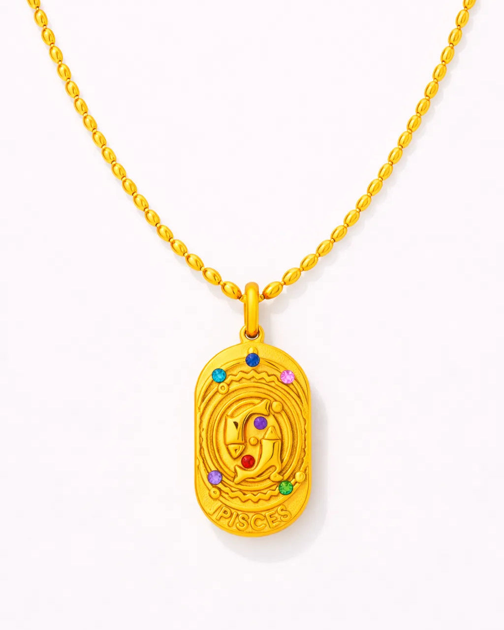 Gold pendant necklace with colorful stones on a white background