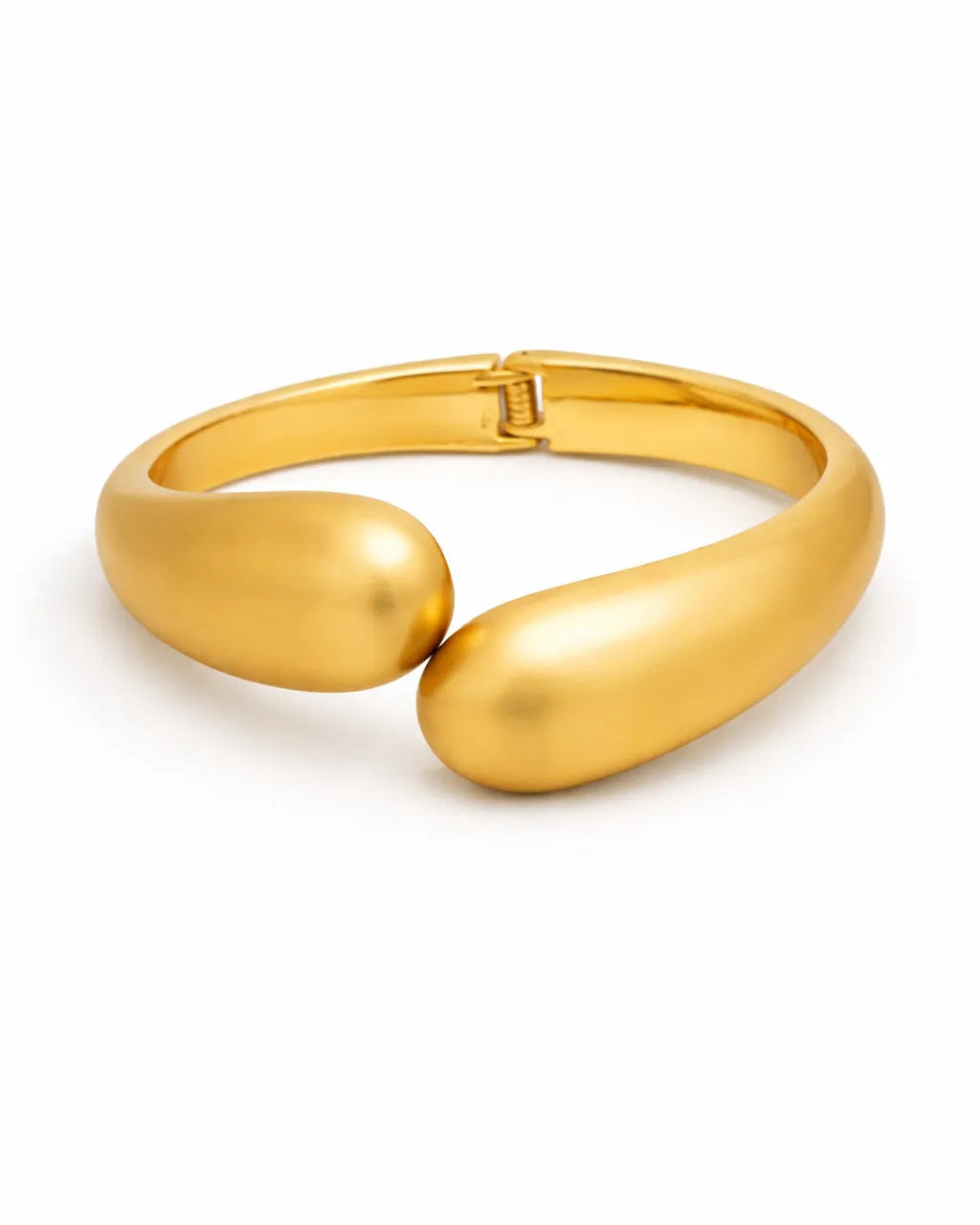 Gold bracelet on a white background
